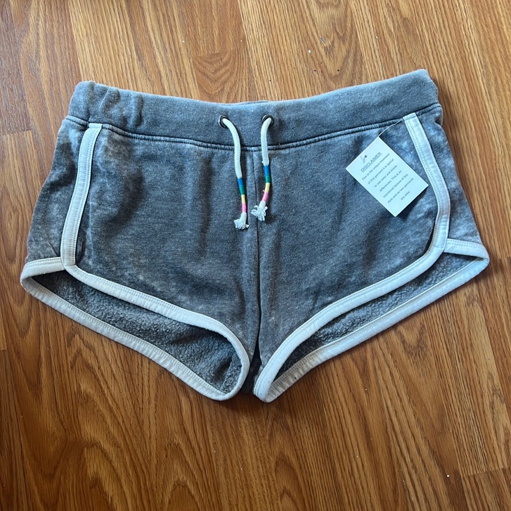 Super cute strings on the shorts to tie it tighter. Just never got to wearing.